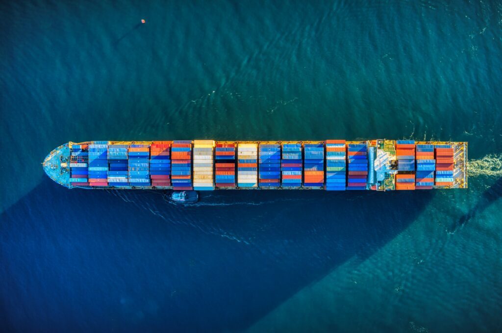 An aerial view of a Cargo Vessel on the ocean.