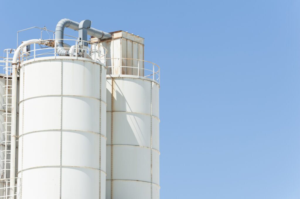 White silos for the storage of lime and cement