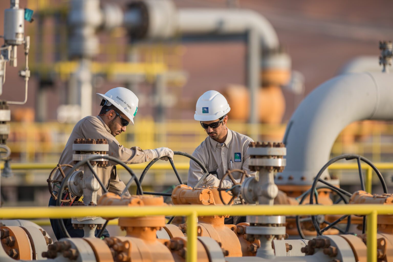 Two engineers working at a Saudi Aramco Facility. Credit: Aramco