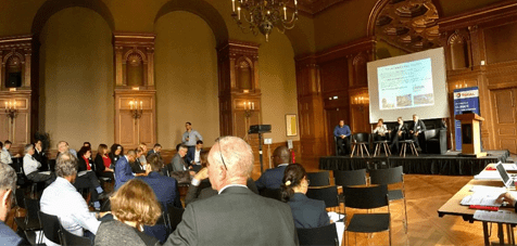 A shot from OGCI's workshop on Capturing the Value of CCUS, taken from behind the audience and looking towards the panel and presentation.