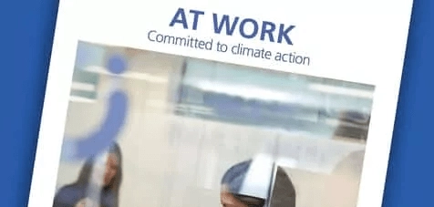 A close up of the At Work Committed to Climate Action report