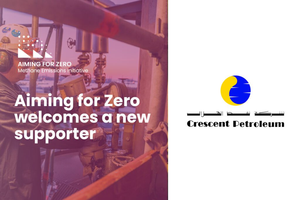 The title of the news article, "Aiming for Zero welcomes a new signatory" overlaid on a picture of a male engineer working at an oil facility, which has a pink overlay on it. The Aiming for Zero logo is in the top left. To the right, on a white background, is the Crescent Petroleum logo.